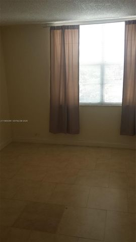 492 NW 165th St Rd C-509, Miami, FL 33169