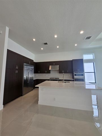 9421 Tulip Leaf Ct, Boca Raton, FL 33434