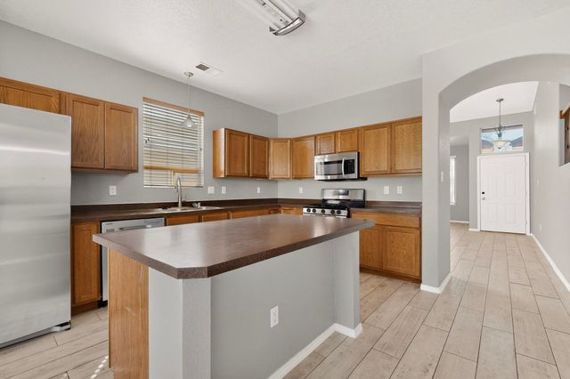 1328 Peppoli Loop SE, Rio Rancho, NM 87124