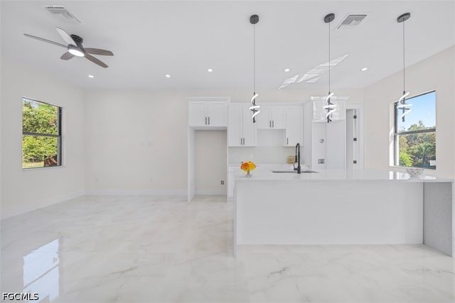 1553 Meadow RD, Lehigh Acres, FL 33976