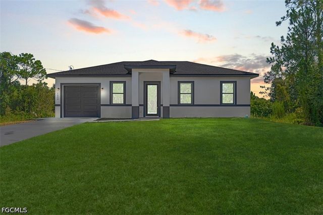 1553 Meadow RD, Lehigh Acres, FL 33976