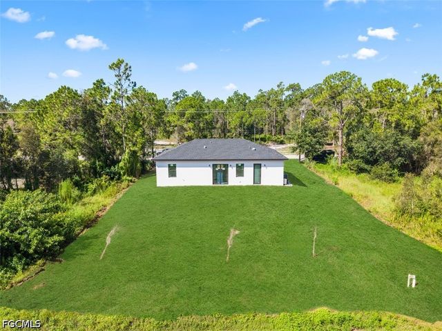 1553 Meadow RD, Lehigh Acres, FL 33976