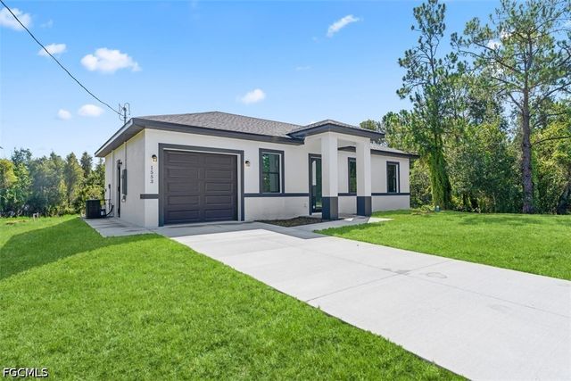 1553 Meadow RD, Lehigh Acres, FL 33976