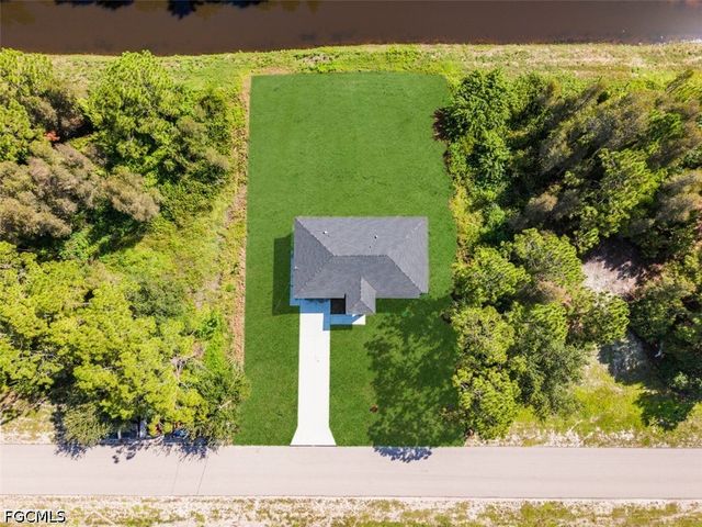 1553 Meadow RD, Lehigh Acres, FL 33976