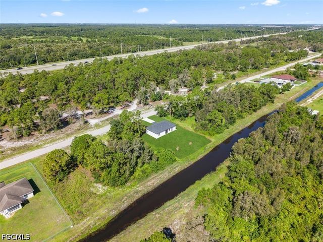 1553 Meadow RD, Lehigh Acres, FL 33976
