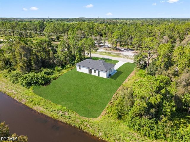 1553 Meadow RD, Lehigh Acres, FL 33976