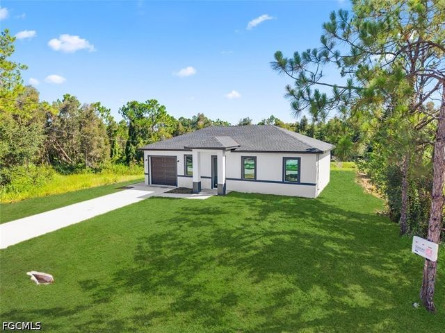 1553 Meadow RD, Lehigh Acres, FL 33976