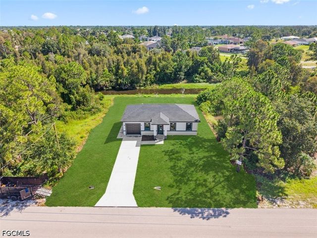 1553 Meadow RD, Lehigh Acres, FL 33976