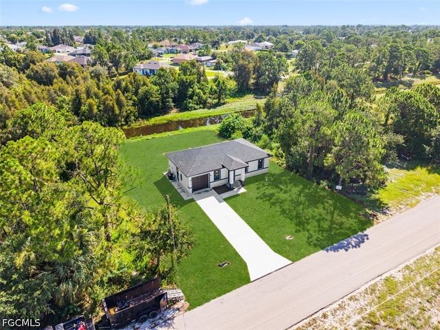 1553 Meadow RD, Lehigh Acres, FL 33976