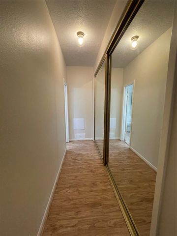 12 Hallmark Drive, Panorama Village, TX 77304