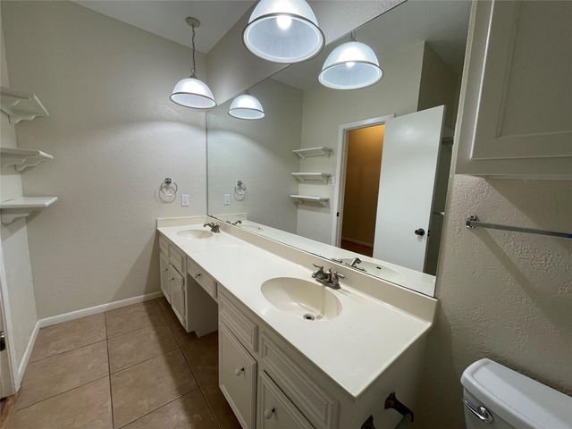 12 Hallmark Drive, Panorama Village, TX 77304