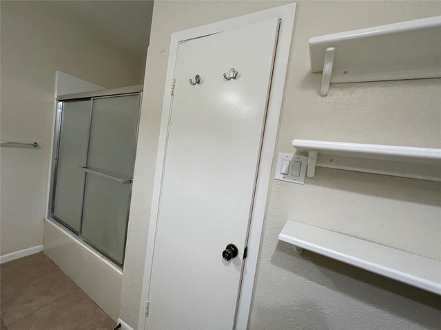 12 Hallmark Drive, Panorama Village, TX 77304