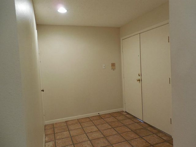 12 Hallmark Drive, Panorama Village, TX 77304