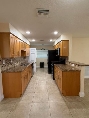 7302 NW 57th Court, Tamarac, FL 33321