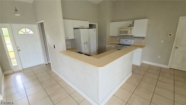 207 E 8th ST, Lehigh Acres, FL 33972