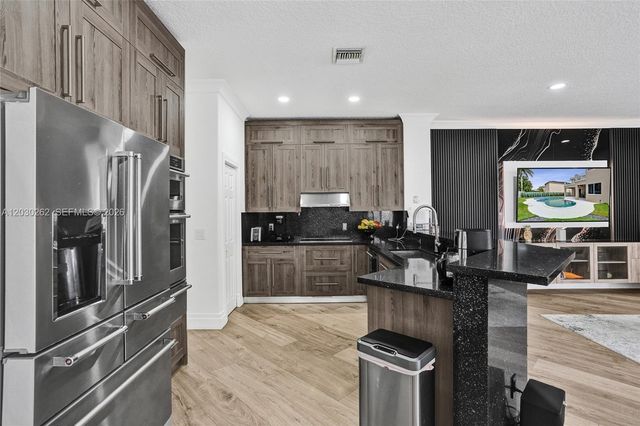 16180 SW 14th Street, Pembroke Pines, FL 33027