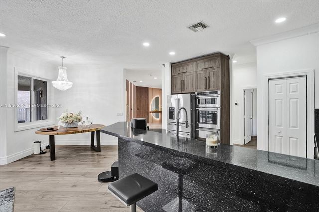 16180 SW 14th Street, Pembroke Pines, FL 33027