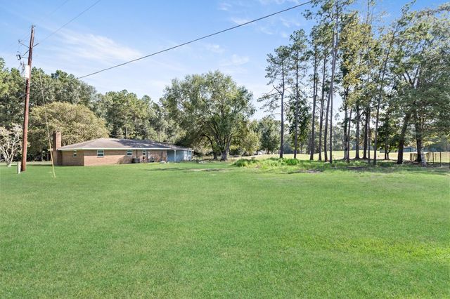 1237 Wildwood Drive, Village Mills, TX 77663