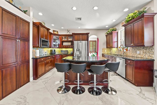 9133 Delemar Court, Wellington, FL 33414