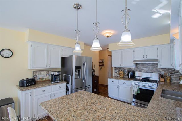 16448 Trailway Drive, Macomb, MI 48042