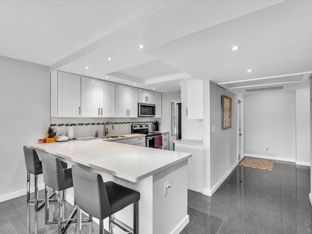 4030 W Palm Aire Drive 308, Pompano Beach, FL 33069