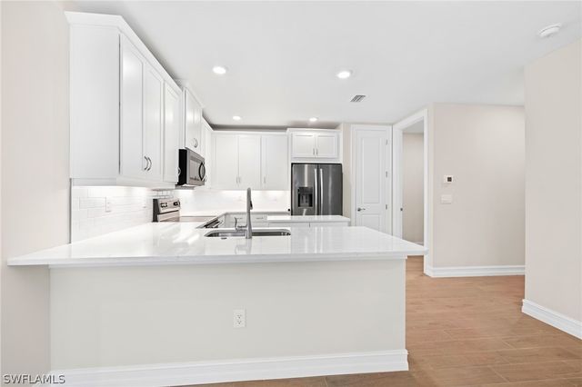 21864 Milan Villas LN, Estero, FL 33928