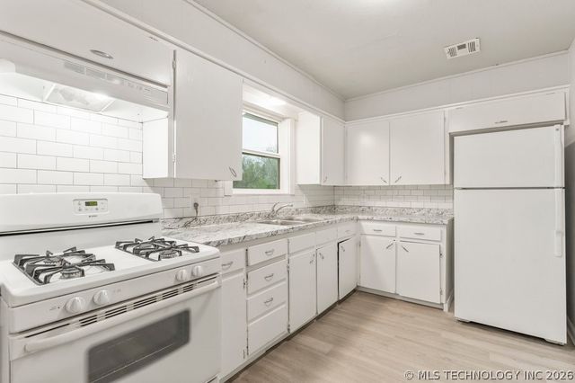 552 E 55th Place N, Tulsa, OK 74126