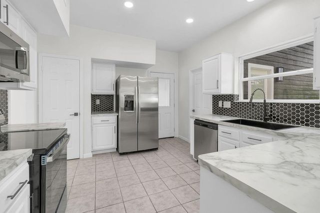 6239 Oak Pass Drive, Houston, TX 77091