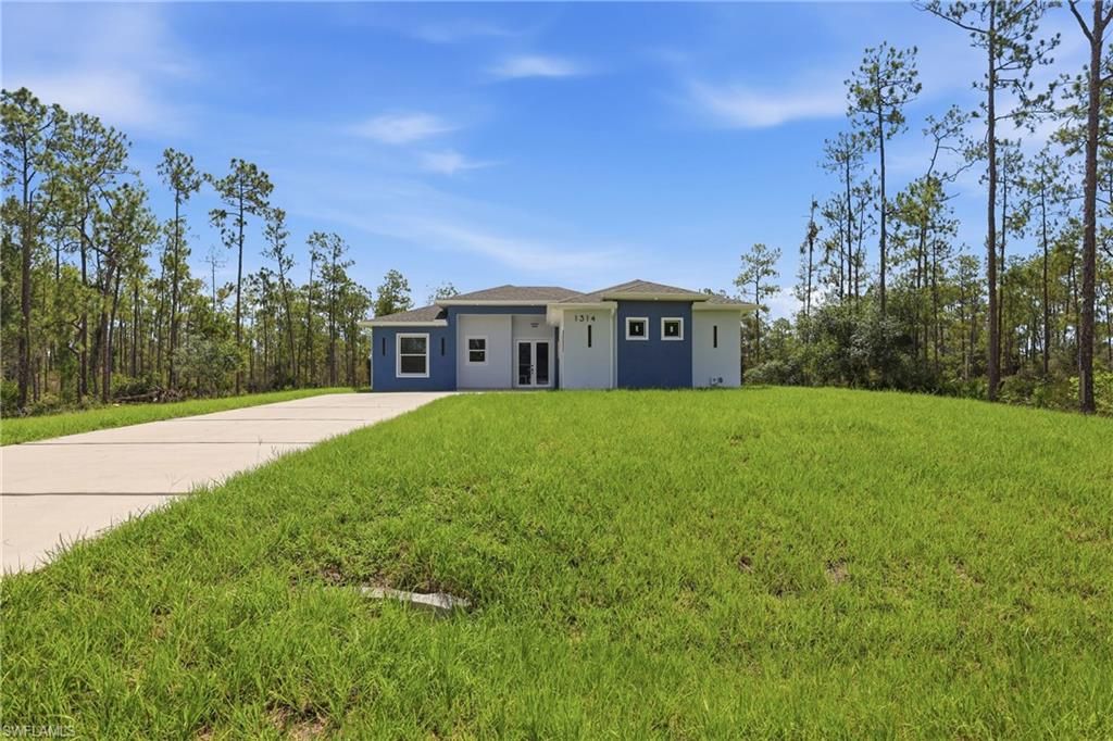1314 Dayton AVE, LEHIGH ACRES, FL 33972 — exterior