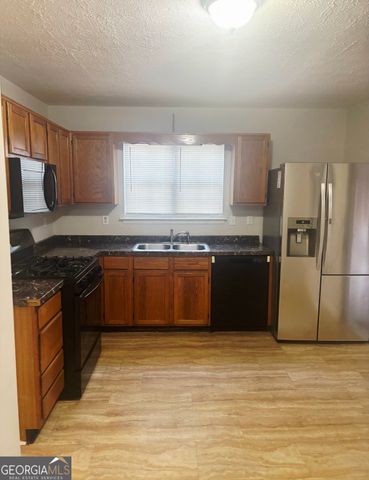 557 Crestridge Court, Stone Mountain, GA 30083