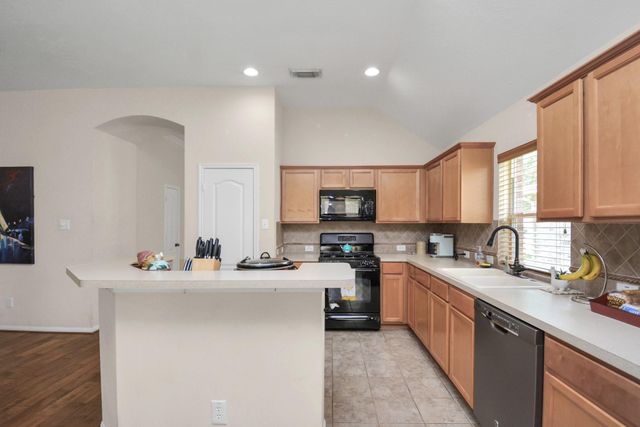 3311 Raintree Village Drive, Katy, TX 77449