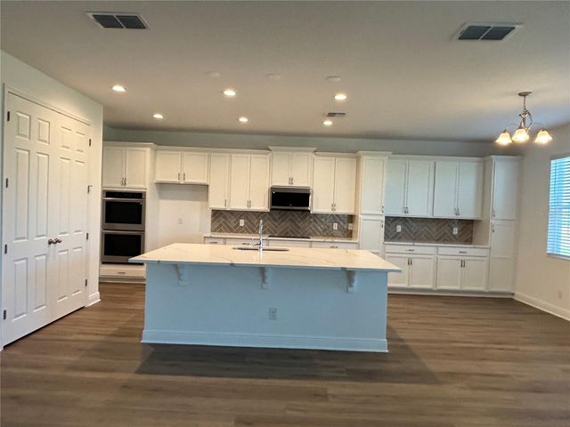 6982 ROLLING GARDENS LOOP, Groveland, FL 34736