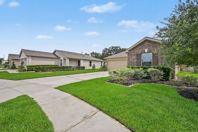 518 Sabino Sky Court, Magnolia, TX 77354