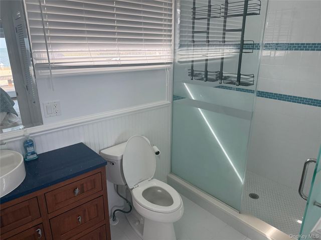 25 Shinnecock Road, East Quogue, NY 11942