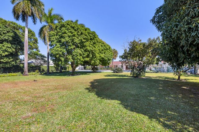 7400 W Lake Drive, Lake Clarke Shores, FL 33406