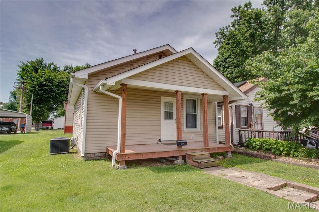 Image 1 of property listing at 110 W Cherry Street, Hartford, IL 62048