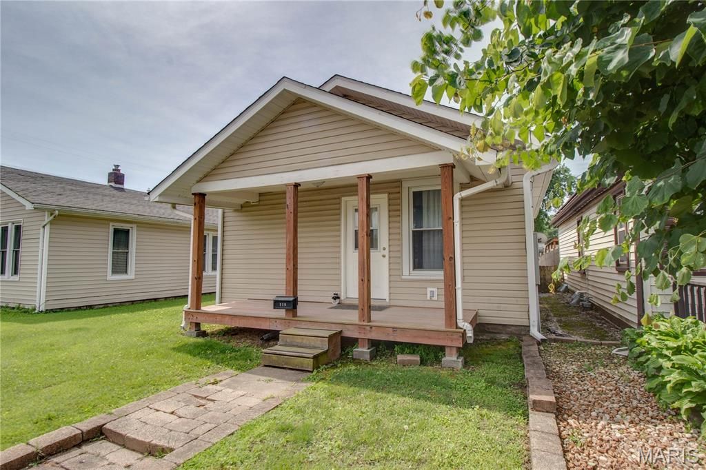 Image 2 of property listing at 110 W Cherry Street, Hartford, IL 62048