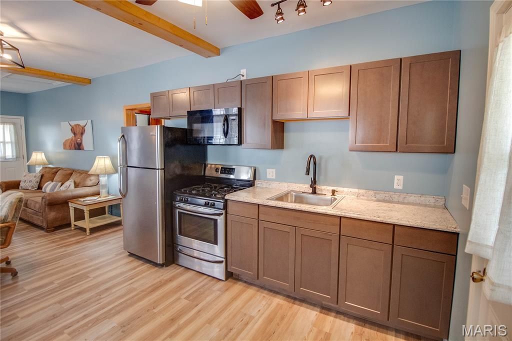 Image 12 of property listing at 110 W Cherry Street, Hartford, IL 62048