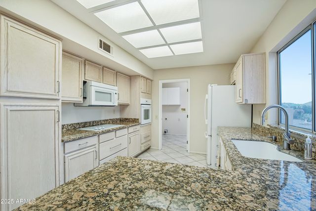 13553 W WHITEWOOD Drive, Sun City West, AZ 85375