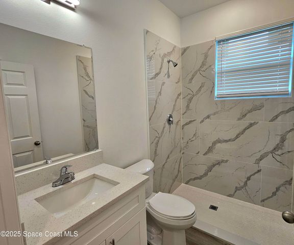 561 Harrisburg Street SW, Palm Bay, FL 32908