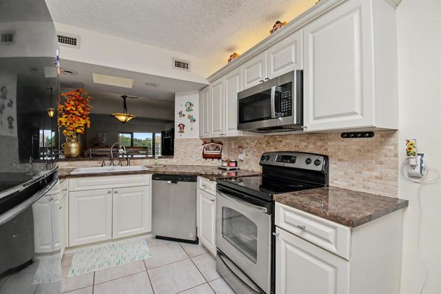 23370 N Carolwood Lane N 409, Boca Raton, FL 33428