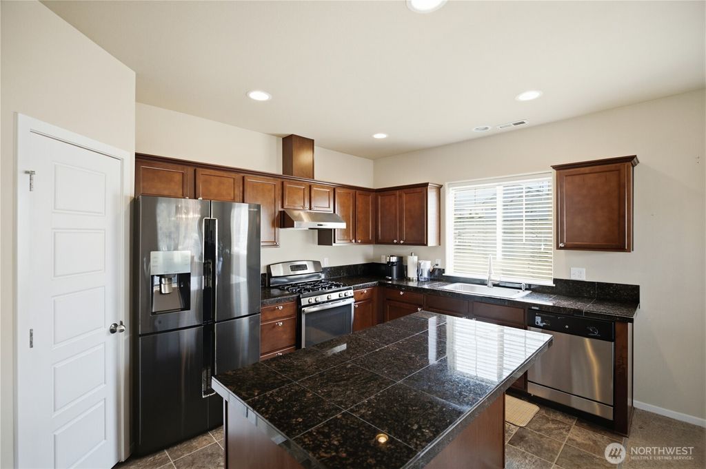 Image 18 of property listing at 9323 S Ainsworth Avenue, Tacoma, WA 98444