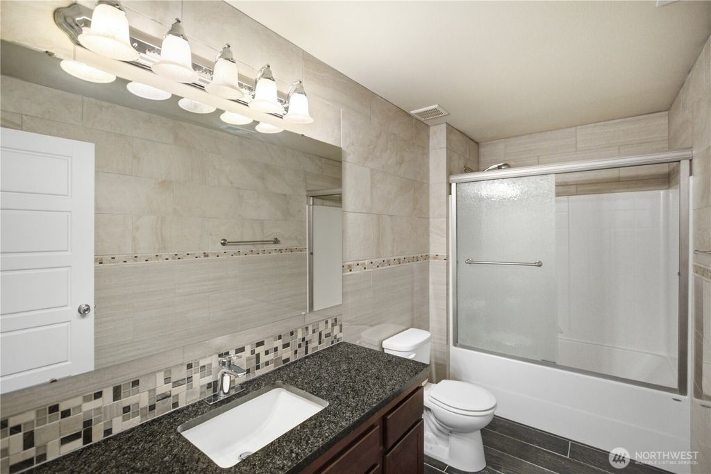 Image 25 of property listing at 9323 S Ainsworth Avenue, Tacoma, WA 98444