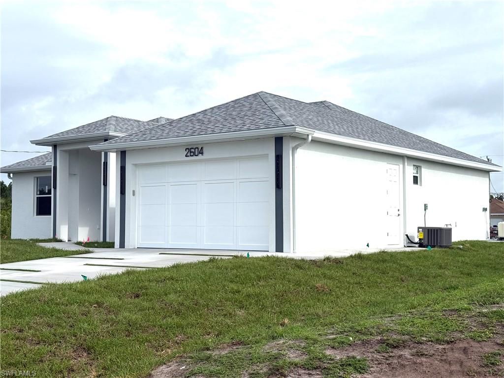 2604 15th ST SW, LEHIGH ACRES, FL 33976 — exterior