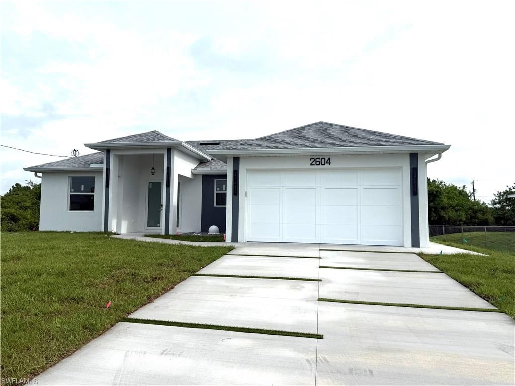 2604 15th ST SW, LEHIGH ACRES, FL 33976 — photo 2