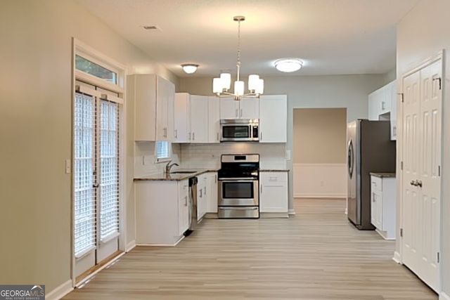 7119 Big Woods Drive, Woodstock, GA 30189