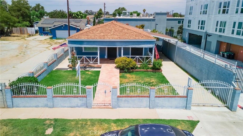 Image 1 of property listing at 451 E 124th, Los Angeles, CA 90061