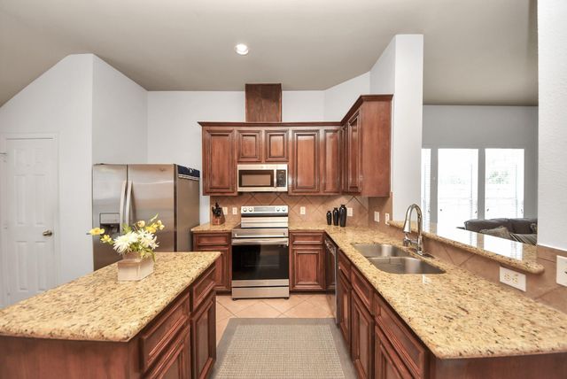 9302 Water Edge Point Lane, Humble, TX 77396