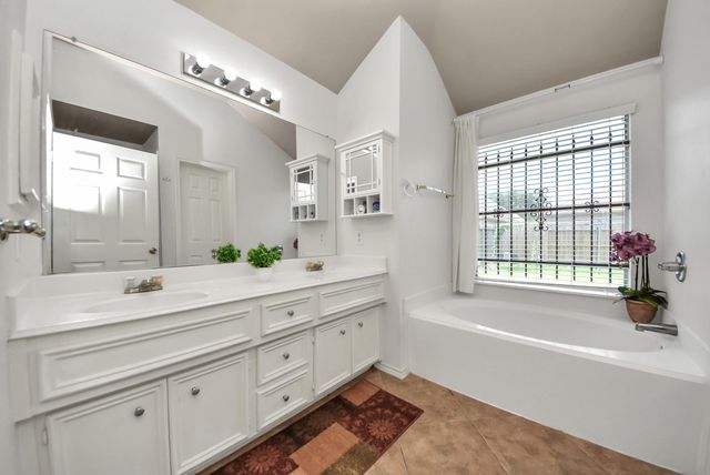 9302 Water Edge Point Lane, Humble, TX 77396