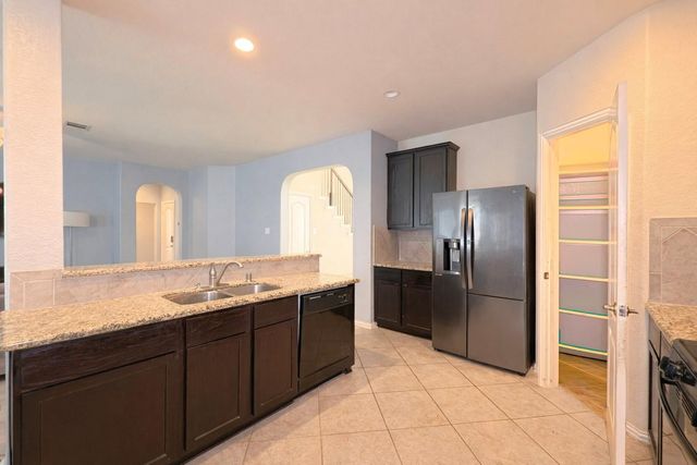 9707 Shimmering Lakes Drive, Rosharon, TX 77583